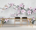 3D floral wallpaper mural featuring soft pink cherry blossom flowers and tree branches on a light grey background in a modern kids room setting.