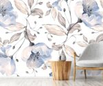 Blue floral wallpaper mural with soft watercolor flowers and beige leaves on light background