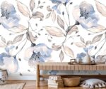 Blue floral wallpaper mural with soft watercolor flowers and beige leaves on light background