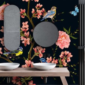 Dark floral wallpaper mural with pink roses, blossom branches, blue bird and butterflies on deep navy background.
