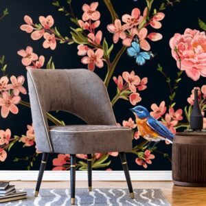 Dark floral wallpaper mural with pink roses, blossom branches, blue bird and butterflies on deep navy background.