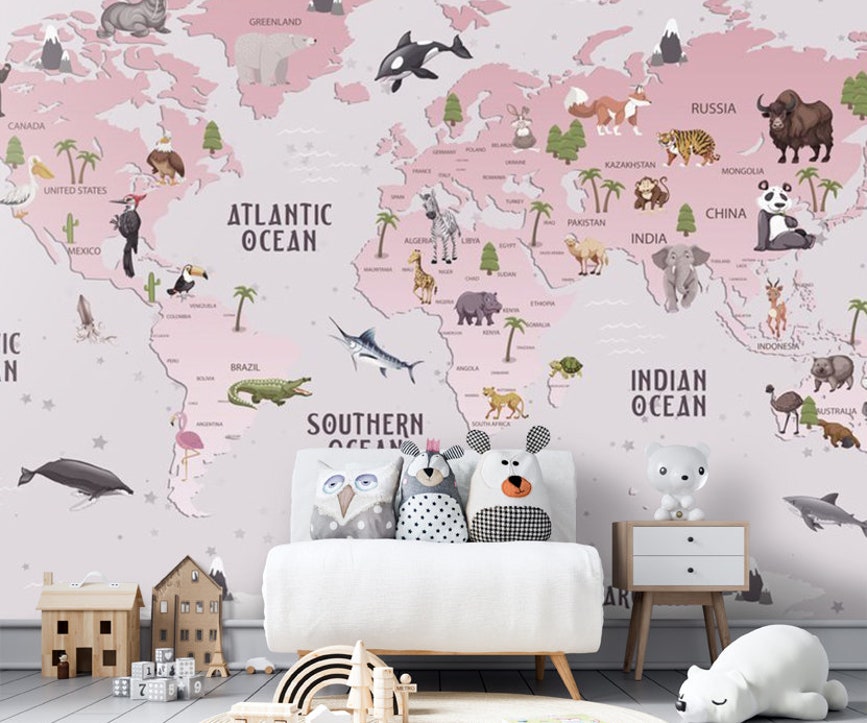 Kids World Map Wallpaper with Animals – Educational Nursery Wall Mural Kids world map wallpaper featuring animals from different continents, soft pink educational wall mural for children’s room and nursery decor