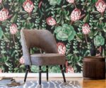 "Wall mural of tropical Protea flower with dense green botanical leaves - natural plant background for home decor"