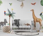 Safari animals wall decals for nursery featuring a giraffe, zebra, and monkey with tropical birds and palm trees above a white crib.